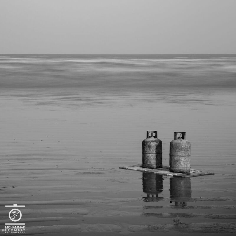 Two gas capsules and beachphoto preview