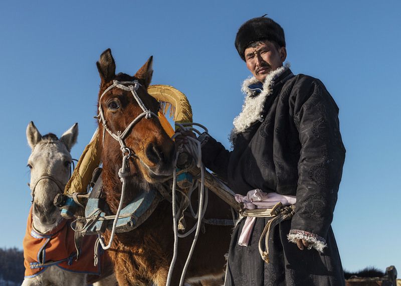 mongolian noamdic winter ice festival khuvsgul lake horse man portrait Mongolian winter ice festivalphoto preview