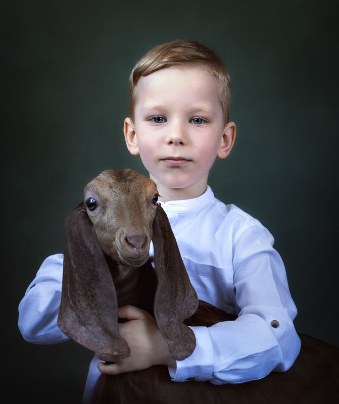 Мальчик с козочкойphoto preview