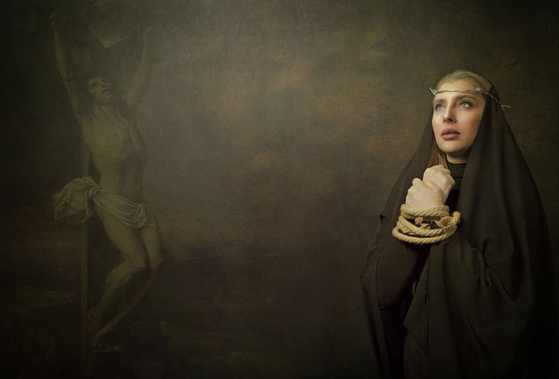 conceptual portrait, religious symbolism, baroque style, female figure, sorrow, rope symbolism, crown of thorns, cinematic lighting, dramatic scene, spiritual photography, passion, chiaroscuro, emotional expression, fine art photography, devotional imager photo preview