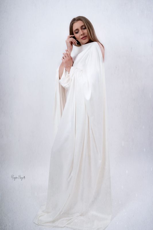 ethereal, fine art, white drapery, soft light, elegance, serenity, minimalism, feminine grace, dreamy, purity, portrait, conceptual photography, emotional depth, studio photography, timeless beauty Echoes of Purityphoto preview