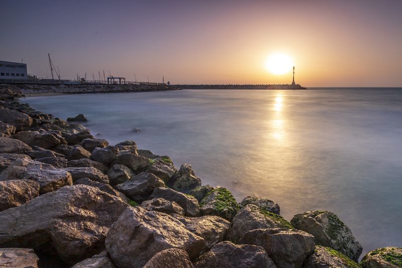 sea, seascape, sunset, landscape, beach, marina, lighthouse, rocks  фото превью