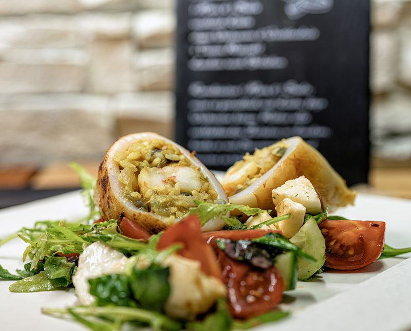 еда Фаршированный кальмарphoto preview