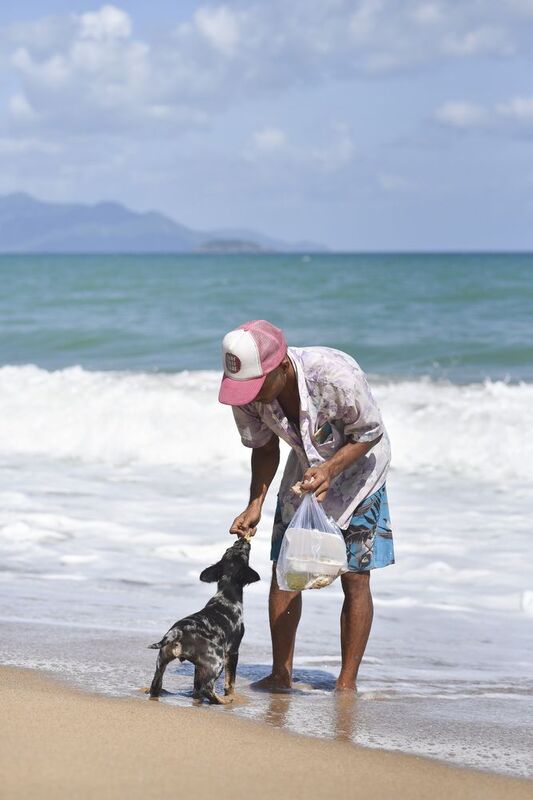 Beachlife of a local boy and his puppy photo preview