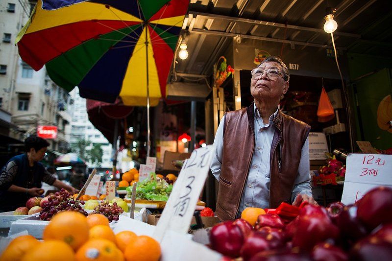 Гонконг Продавцы с рынка в Гонконгеphoto preview