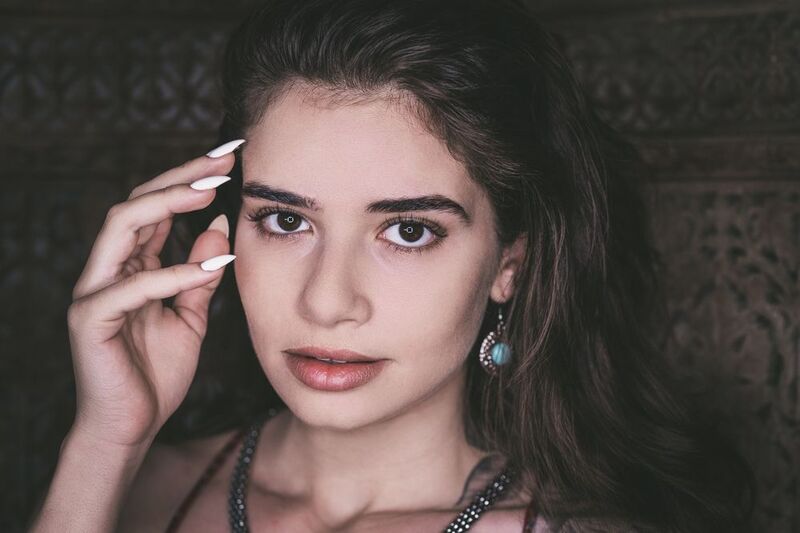 portrait, photography, natural, light, model, beauty, eyes, hand, pose, brunette, soft, lighting, intimate, authentic, genuine, expression, close-up, warm, tones, earrings, jewelry, contemplative, serene, peaceful, Adyphoto preview