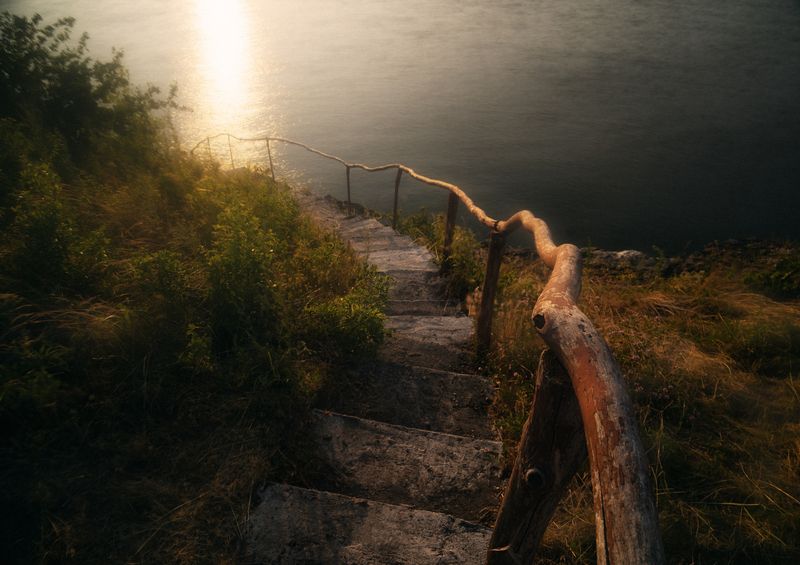 landscape, golden hour, leading lines, handrail, steps, coastline, minimal, cinematic, moody landscape, nature, water, evening, texture, filmic, solitude, path, stairs, wood, reflection, outdoor Лестница к золотой тишинеphoto preview