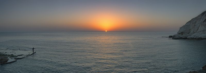 Закат солнце море скала Рош Аникра  Sunsetphoto preview