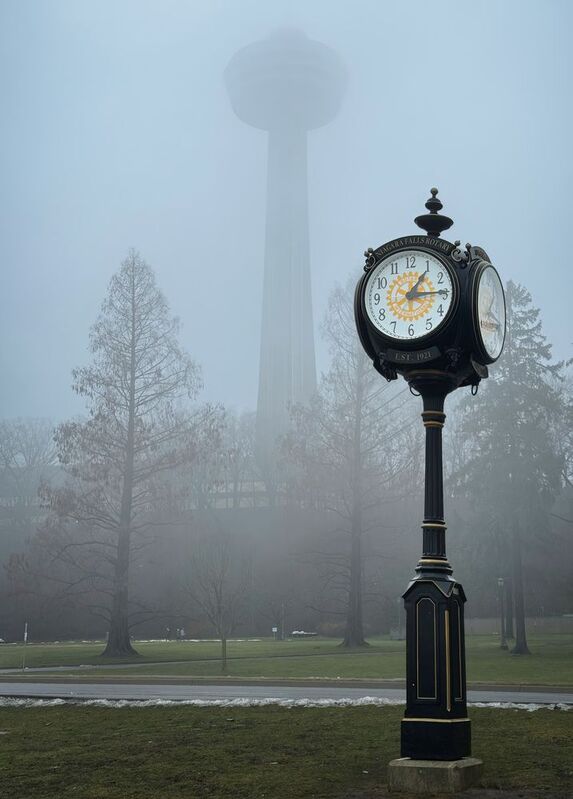 #Sky #Plant #Clock #Tree #Atmospheric phenomenon #Street light #Fog #Gas #Grass #Pole A quarter past onephoto preview