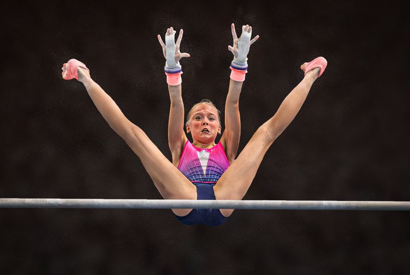 #sports #gymnastics #sports_phototography Reach for the barphoto preview