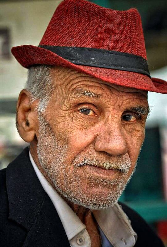 Read today: The world is in turmoil...the latest news. Buy the newspaper please. The world is at hand... he leaves silently.  ... He leaves silently, where there is neither world nor injustice... The sad newspaper seller... Goodbye, veteran communist. Resphoto preview