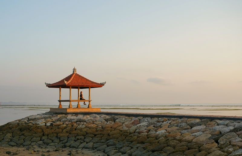dawn, morning, beach, shore, summer, sun, ocean, sea, waiting, meeting, asia, bali, woman, silence, tranquility Meeting a new dayphoto preview