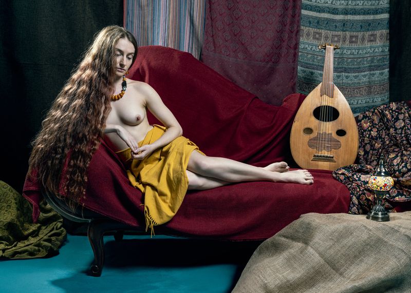 orientalism, odalisque, reclining figure, fine art nude, yellow textile, velvet drapery, lute player, amber jewelry, neoclassical portrait, ingres homage, timeless beauty, contemplation, chiaroscuro lighting, texture study, classical composition, intimacy Odalisque in Yellowphoto preview
