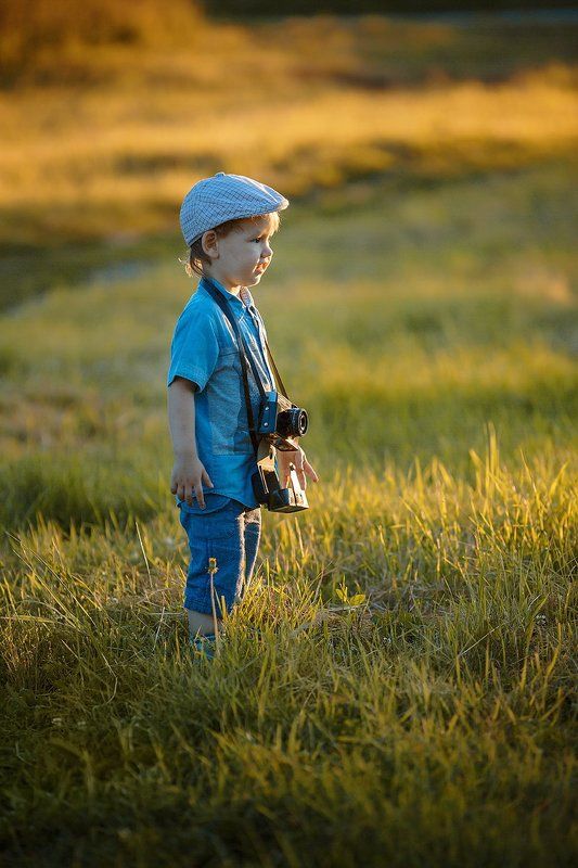 Юный фотографphoto preview