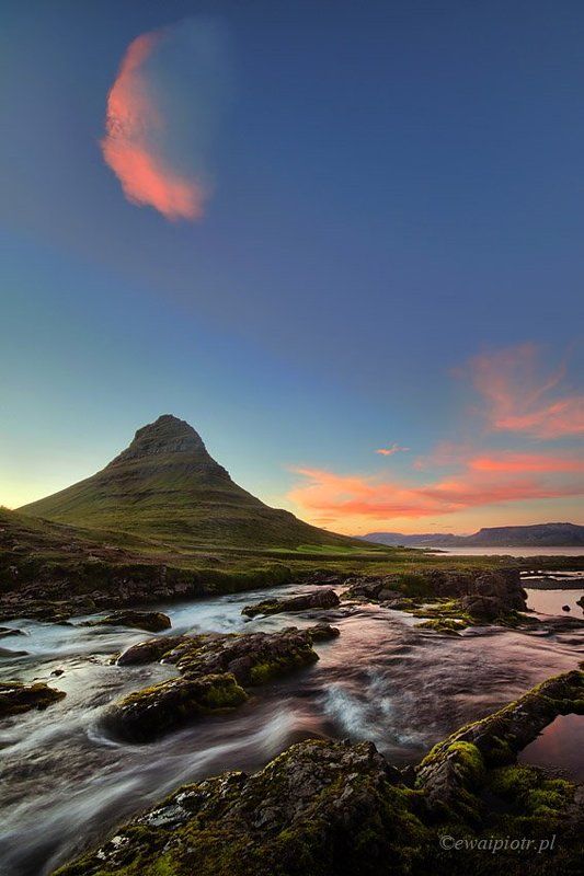 Iceland, Kirkjufell, sunset Pink cloud over Kirkjufellphoto preview