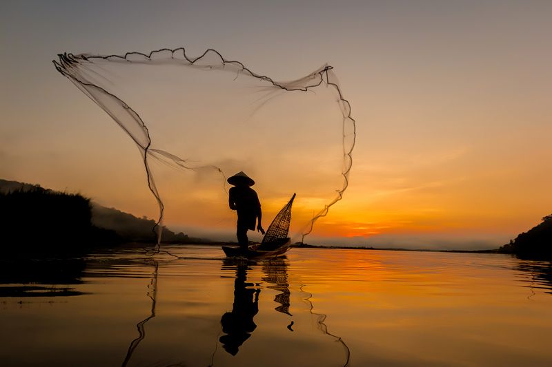 fisherman; thailand; le; net; burma; tropical; river; travel; sunrise; province; myanmar; lake; poor; balance; traditional; bangkok; asia; poverty; mirror; kayak; reflection; tradition; blue; laos; sunset; sap; weed; boat; tourism; ripple; tonle; water; n Silhouette of asian fisherman.photo preview