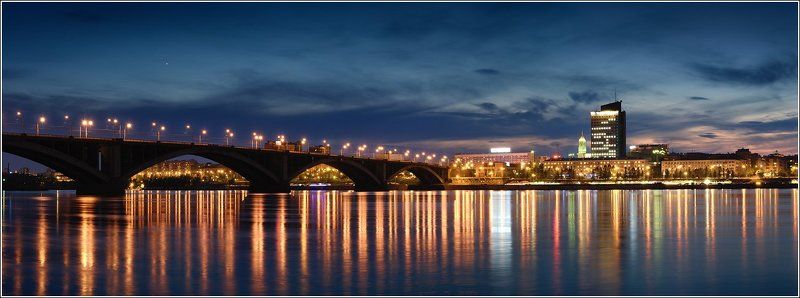 архитектура, большой, вечер, вода, город, енисей, закат, здания, красивый, красноярск, крупный, мост, набережная, ночь, огни, отражение, отражения, панорама, пейзаж, размер, река, свет, светящийся, сибирь, течение, широкий, яркий Красноярск — город на Енисееphoto preview