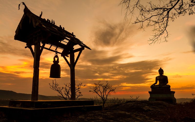 buddha, thai, thailand, sculpture, oriental, travel, precious, statue, wat, yellow, east, spiritual, traditional, asia, faith, figure, idol, heritage, face, sunset, tourism, golden, silhouette, phrabuddhachay, southeast, monk, cloud, sunrise, sitting, gl Buddha statue in sunsetphoto preview
