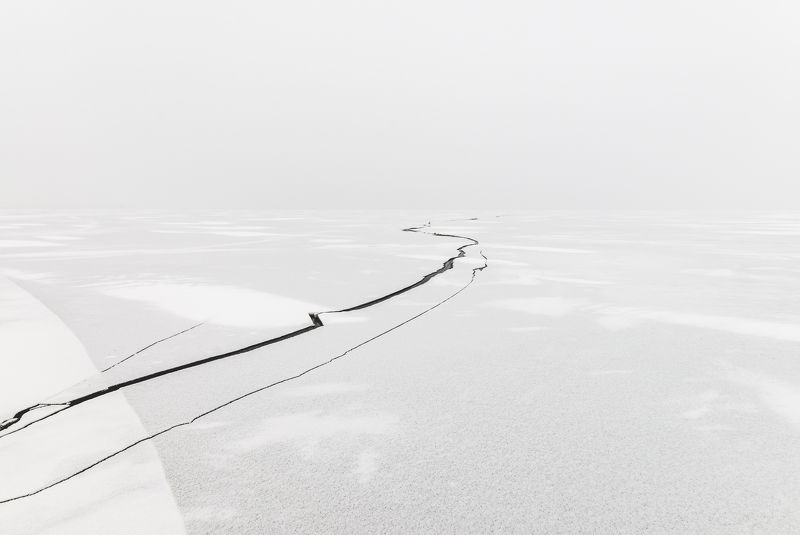 ice, lake, background, cracked, surface, texture, frozen, winter, nature, white, arctic, crack, season, nobody, icy, cold, abstract, blue, cracks, pattern, snow, natural, water, outdoor, pure, crystal, north, frost, russia, river, deep, beautiful Crack in the ice on a frozen lake covered with snow.photo preview