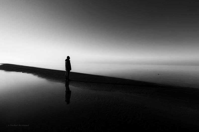 blackandwhite - longexpo - fine art - beach - monochrome - alone among light and darknessphoto preview
