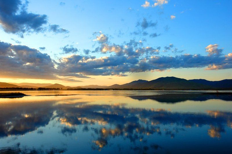 солнце., закат., облака. небо. отражение. Закат на Славянкеphoto preview