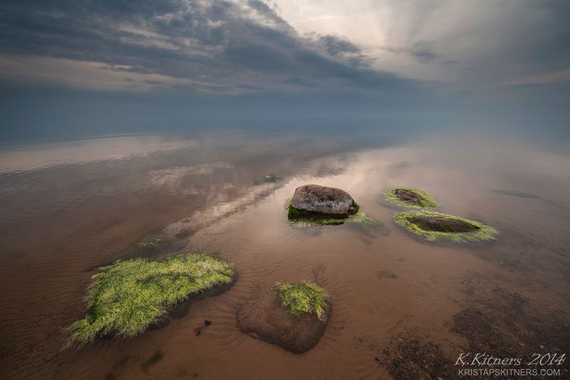 sea seascape water grass fog sky clouds stone reflection sunset evening latvia The Hairy Stonesphoto preview