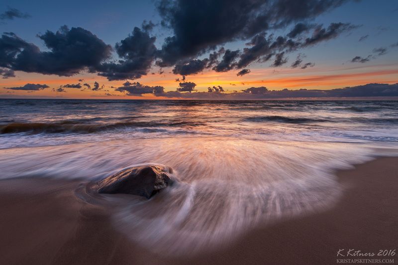 sea seascape water wave sky clouds stone reflection sunset evening latvia The Stone And Wavephoto preview