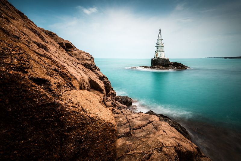 sea,lighthouse, water,rock,clouds,sky,summer,landscape, nature The lighthousephoto preview