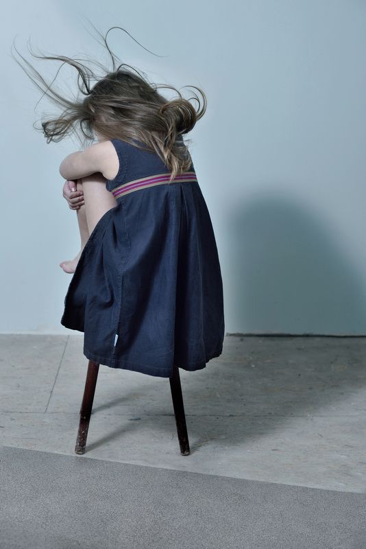 portrait; person; individual; indoor; girl; childhood; child; children; shadow; conceptual; wind; dress; hair; mood Shadow of the windphoto preview