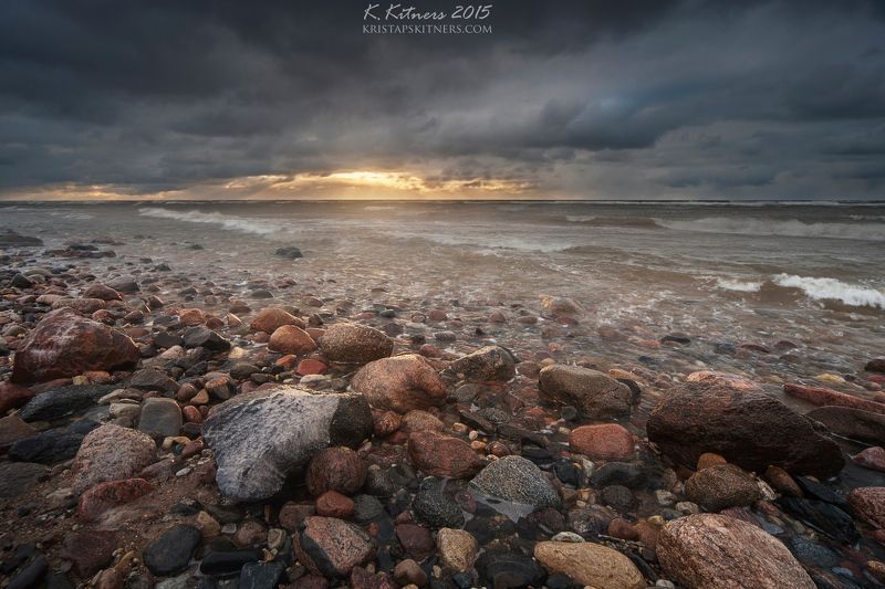 sea seascape water grass fog sky clouds stone reflection sunset storm evening latvia Late Light On Stonesphoto preview
