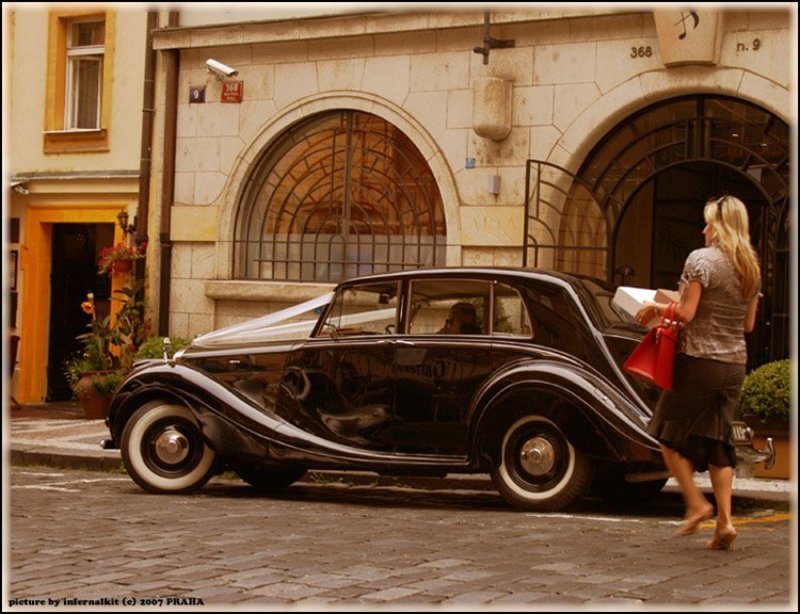 a car, a woman and a sunny noonphoto preview