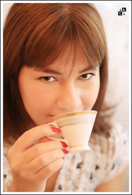 a girl and a cupphoto preview