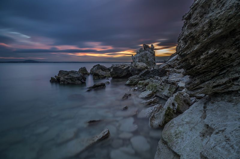 black sea, bulgaria, cliff, island, landscape, long exposure, nature, sea, seascape, sunset, travel Sunset over the rocky beachphoto preview
