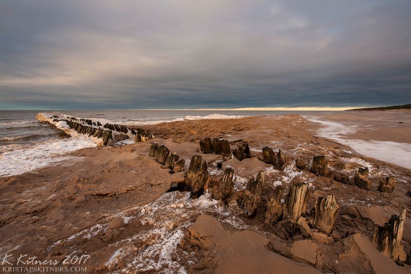 sea seascape ice snow winter sky clouds pier evening latvia Pier In Winterphoto preview