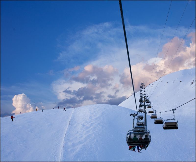 австрия Ишгль Ishgl канатка склон небо облака Канатка в небоphoto preview