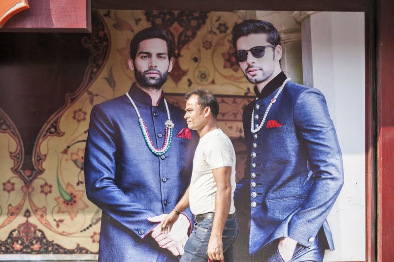 Gobindapaul, Street, Aisa, Urban, child, Bangladeshi_photographer, color,digital,  Billboard behind man photo preview