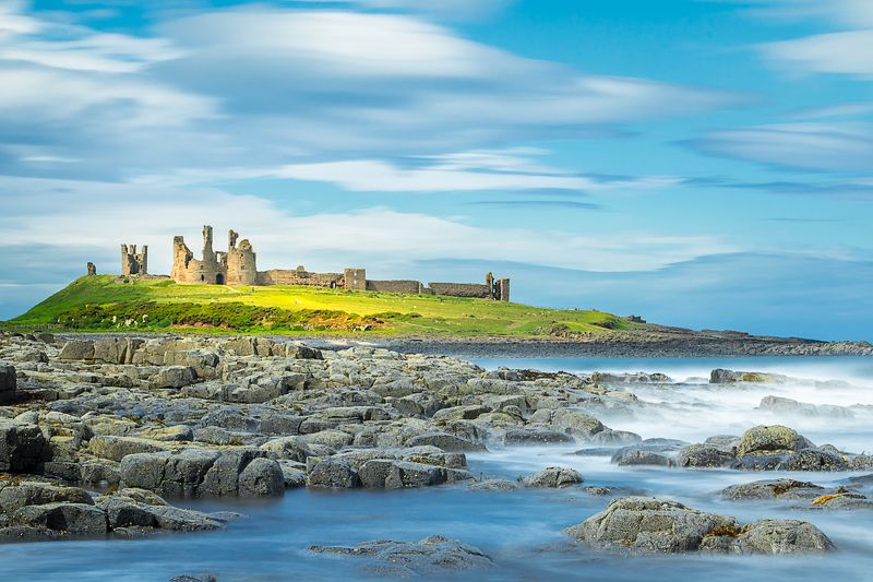 sea long exposure castle clouds landscape beautiful scenery Dunstanburgh Castle. Northumberland photo preview