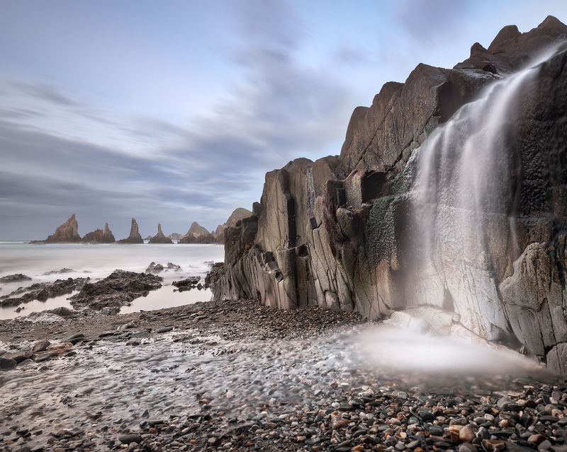 asturias, atlantic, bay, beach, beautiful, cliff, clouds, cloudy, coast, coastal, coastline, cudillero, dusk, europe, evening, gueirua, islets, landmark, landscape, marina, natural, nature, ocean, outdoor, playa, river, rocks, rocky, row, santa, scenic, s The Stream of Lifephoto preview