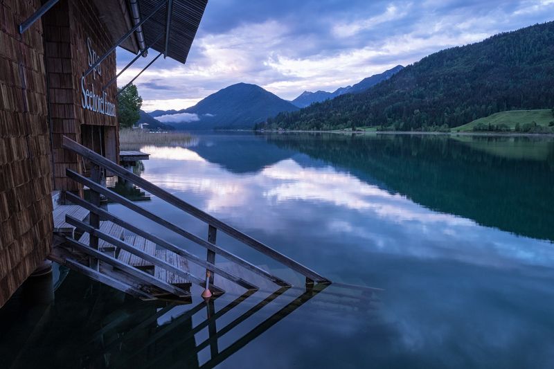 lake river reflection riverbank pier jetty footbridge tourboat standing water pond gmunden hillsborough river Weissensee Austria Weissensee IVphoto preview