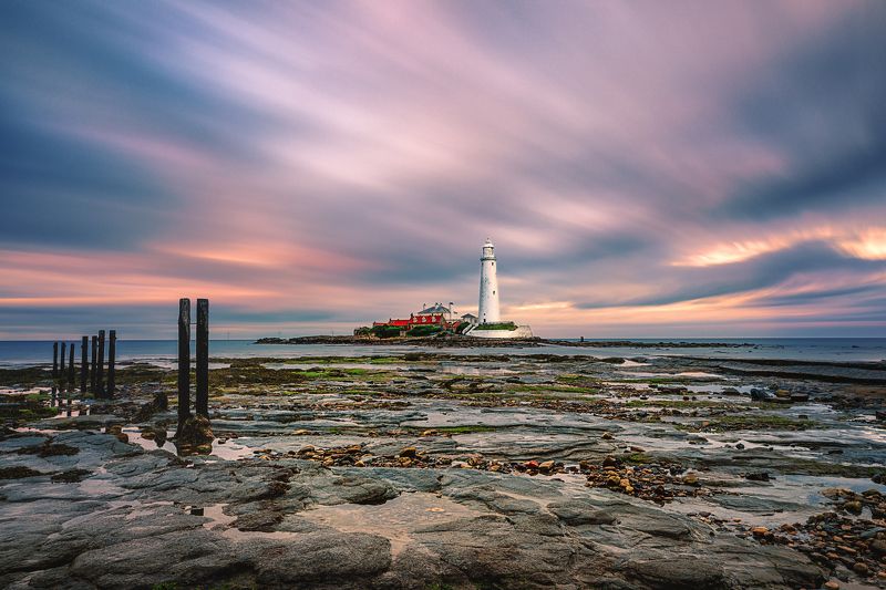 Lighthouse, Low tide, sunset, North sea Low tide. Saint Mary\'s Lighthousephoto preview