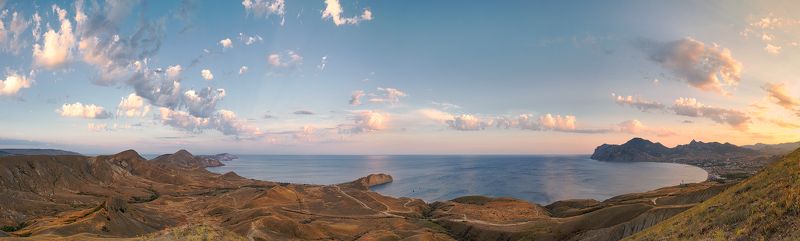 sunset, Black Sea, seacost, seashore, cloudy day, mountaine range A Panorama of Silent Bay and Koktebel at sunset. Black Sea. Crimeaphoto preview
