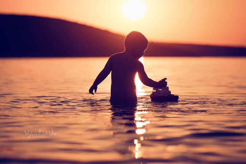 childchood, summer, sea, boy, play, boat, sunset summerphoto preview