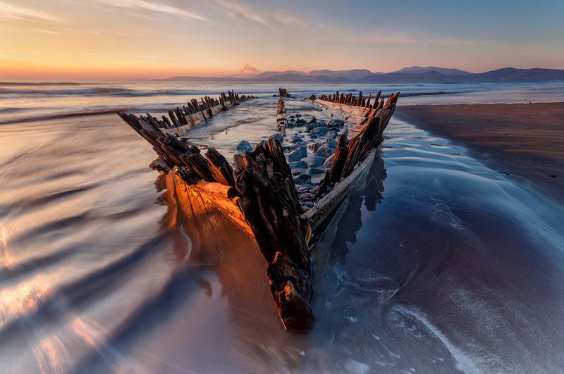 ireland, kerry, rossbeigh, sunset, wreck, boat, ship, beach, iconic, mountains. color, red Sunbeam Wreckphoto preview