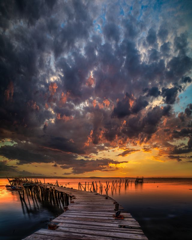 portugal,old pier,sunset,dramatic sky,water,long exposure,evening color,photopills,nikon,zeiss distagon dramatic eveningphoto preview