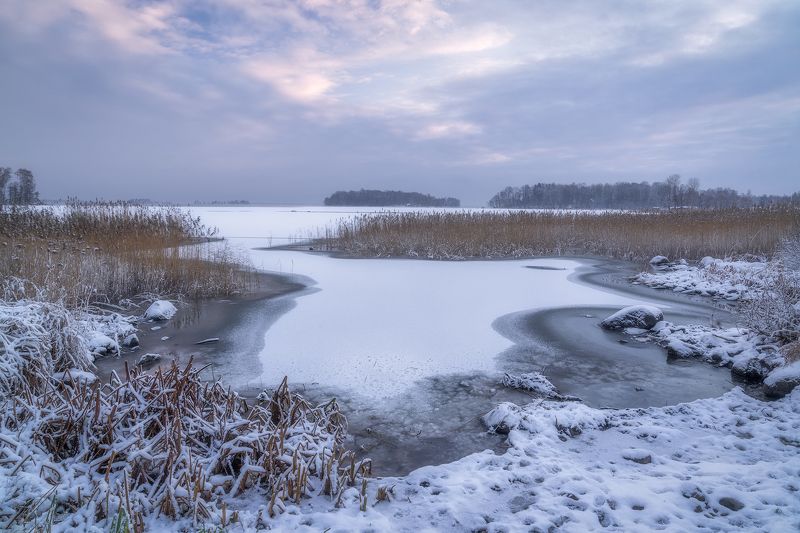 bay, bend, bight, clouds, cove, curve, forest, gulf, hjälmaren, ice, inlet, island, lake, lake hjälmaren, ludwig riml, ludwig riml natural light photography, reed, rocks, snow, snow capped, trees, turn, winding, winter The Bayphoto preview
