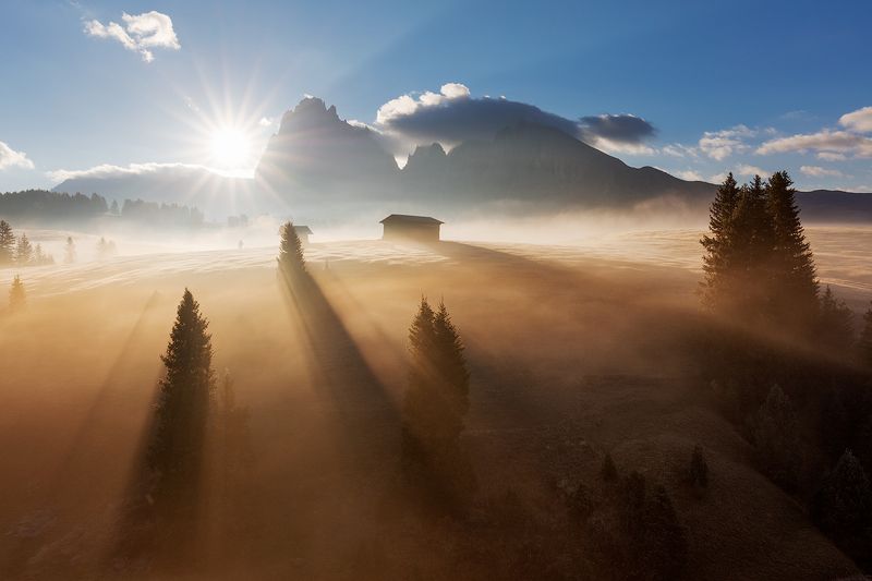 fog, morning, dolomites, peaks, mountains, alps, italy, landscape, mood, atmosphere, sunrise, clouds, trees, sun rays Magic Fogphoto preview