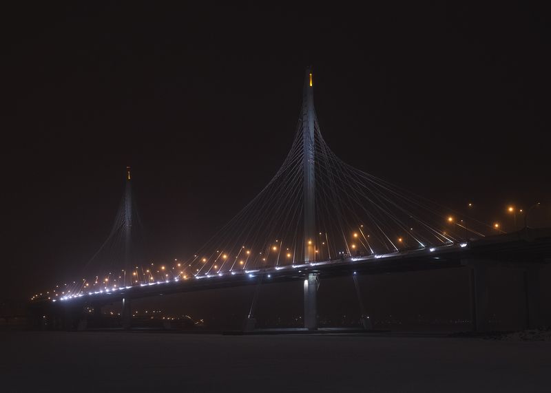 залив зима мост автомост вантовый снег дорога город огни Над зимним заливомphoto preview