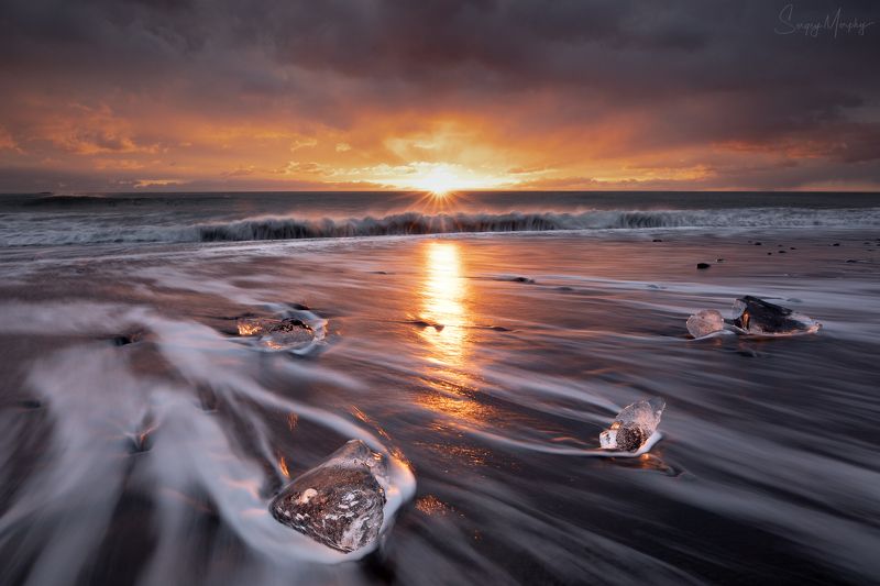 sunrise on black send beach. iceland. Sunrise on black send beach. Iceland.photo preview