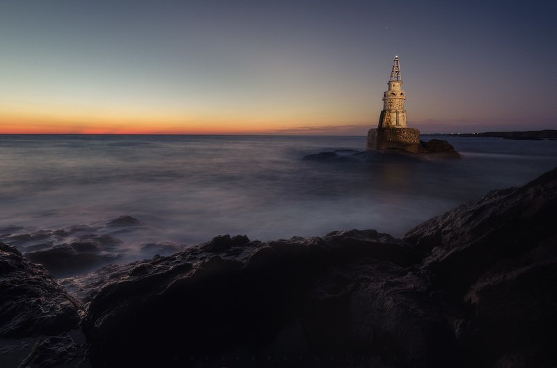 Sunrise near Lighthouse Ahtopol Bulgariaphoto preview