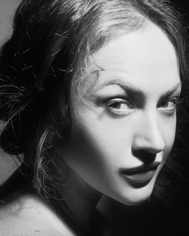 female, portrait, contrasty, sly, fun, joy, smiley, face, woman, black and white, expression, mood Sly Babyphoto preview